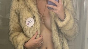 Trans actress Nicole Maines nude selfie in a fur coat, MyCelebrityFakes.com